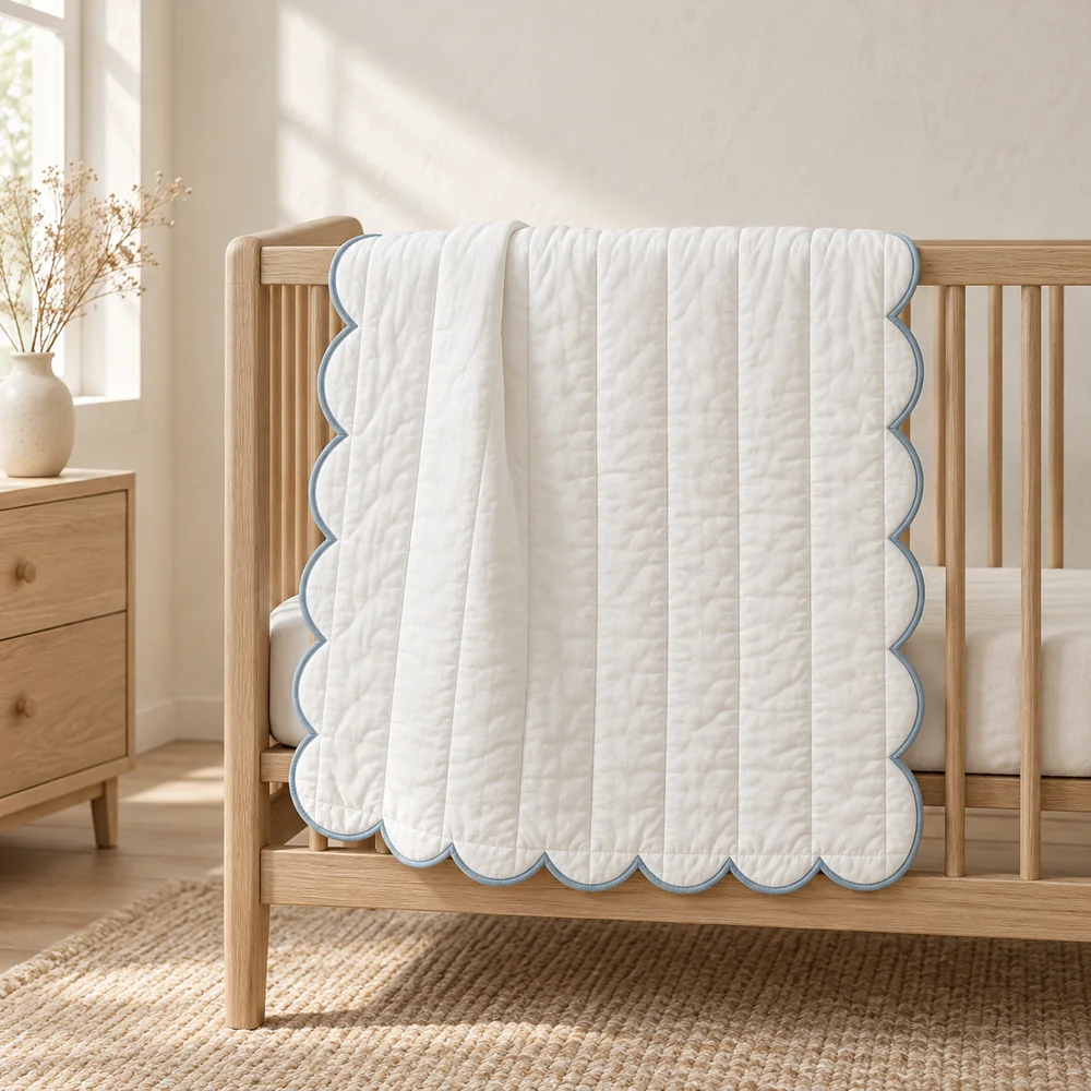 Scalloped quilt in white