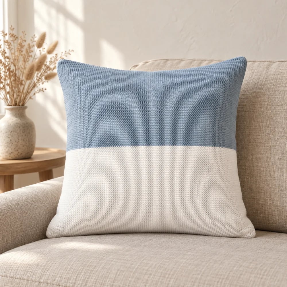 Colourblock knit cushion cover in muted blue