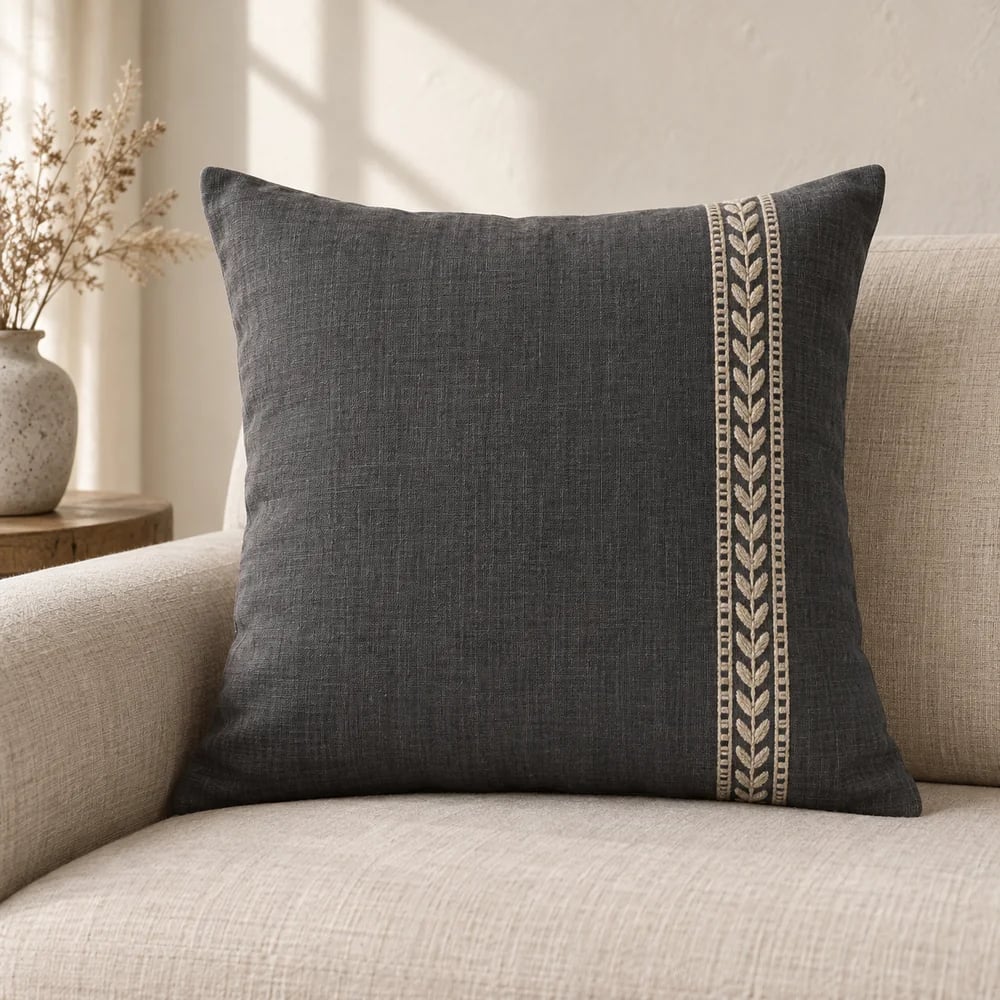 Linen cushion cover, embroidered border in charcoal