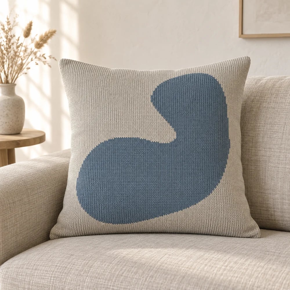Intarsia knit cushion cover in stone