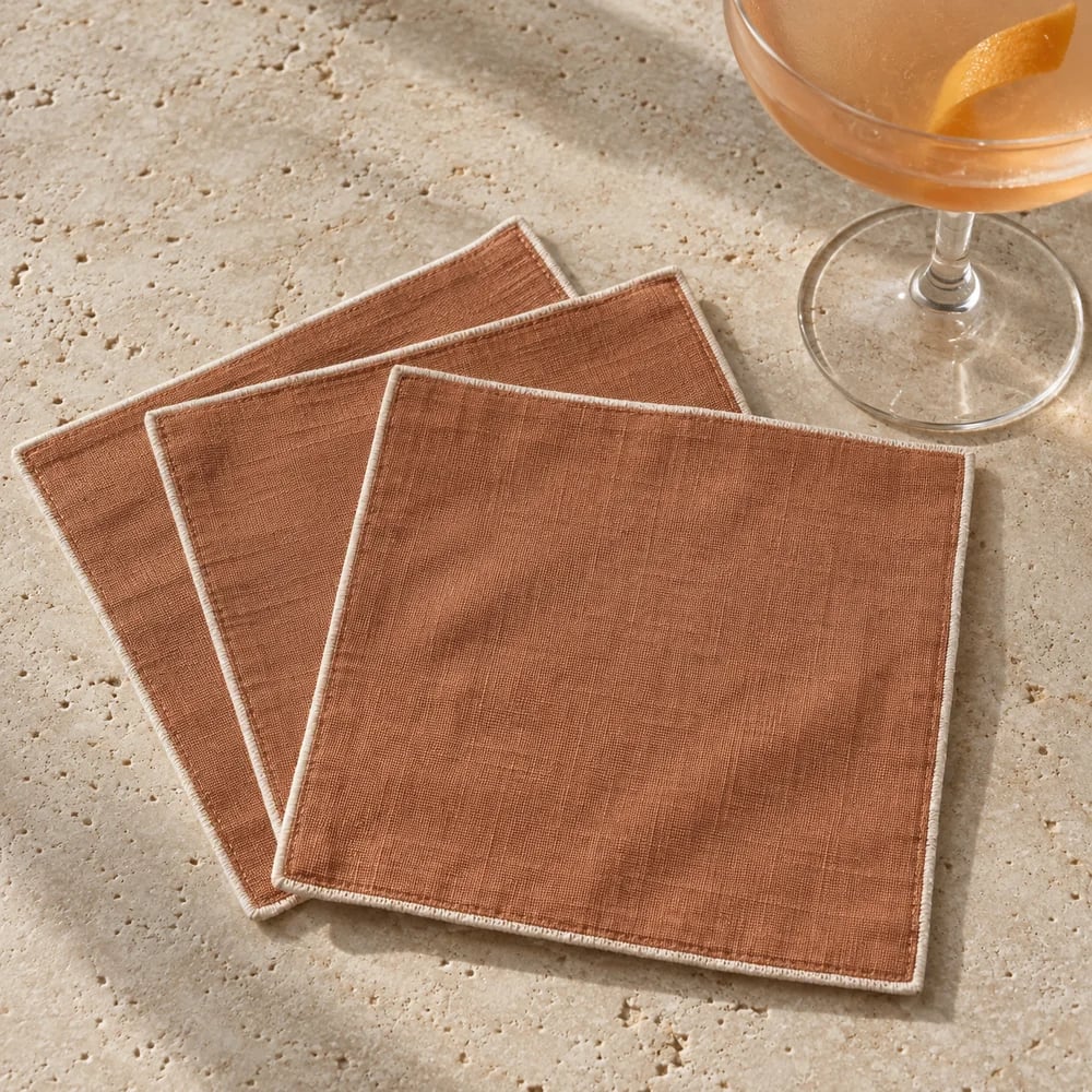 Terracotta cocktail napkin, rolled hem