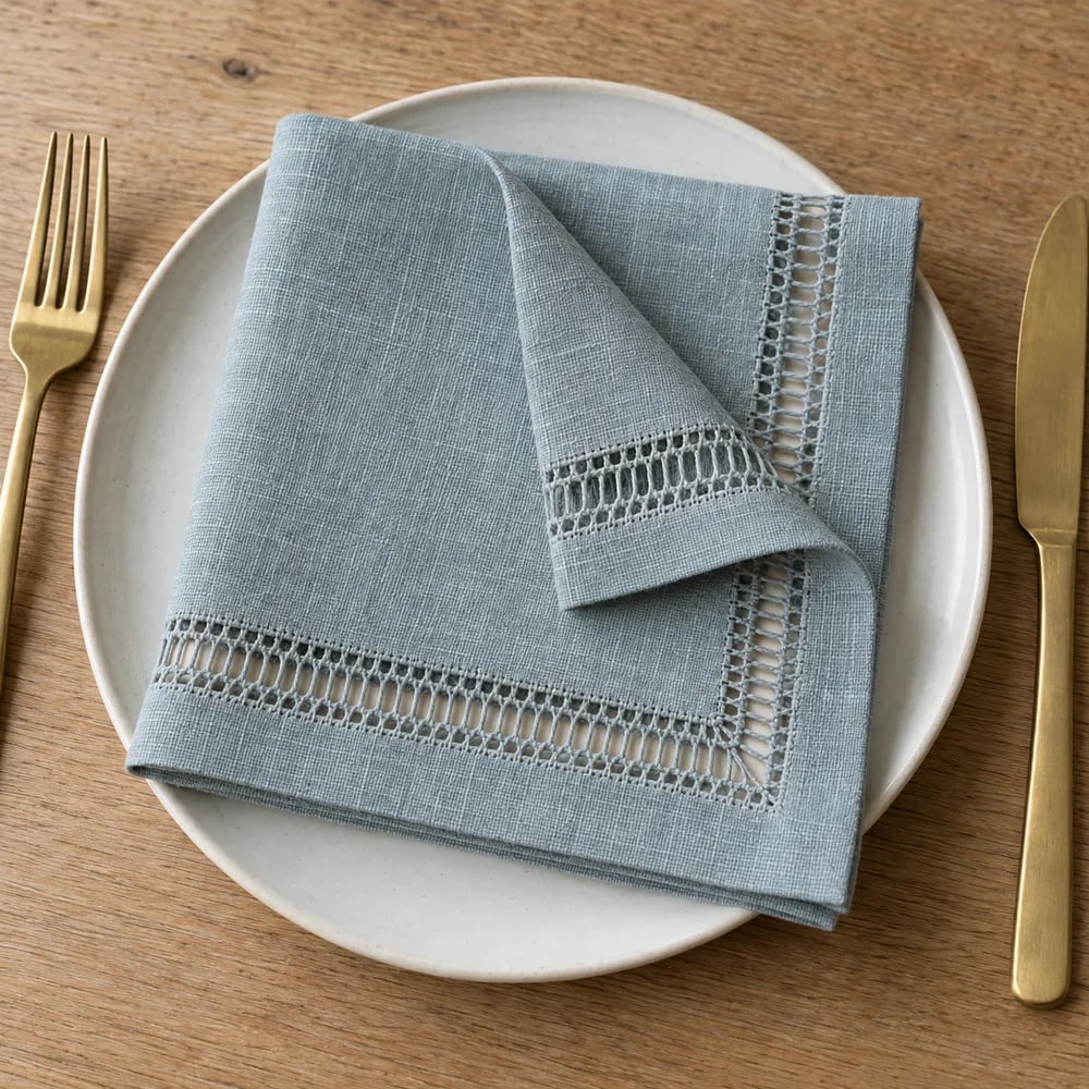 Muted blue dinner napkin, drawn thread work