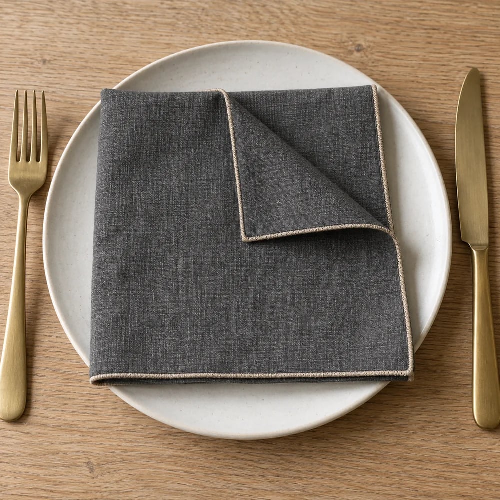 Charcoal dinner napkin, rolled hem