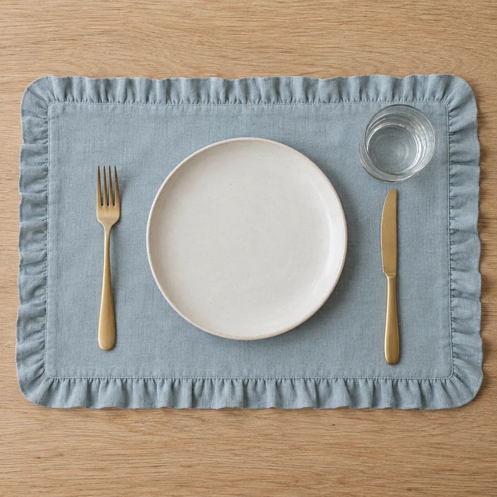 Muted blue placemat, ruffled edge